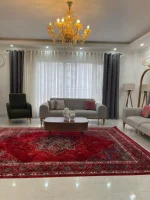فرش لاکی سبز طرح هریس مناسب دکوراسیون کلاسیک و لوکس